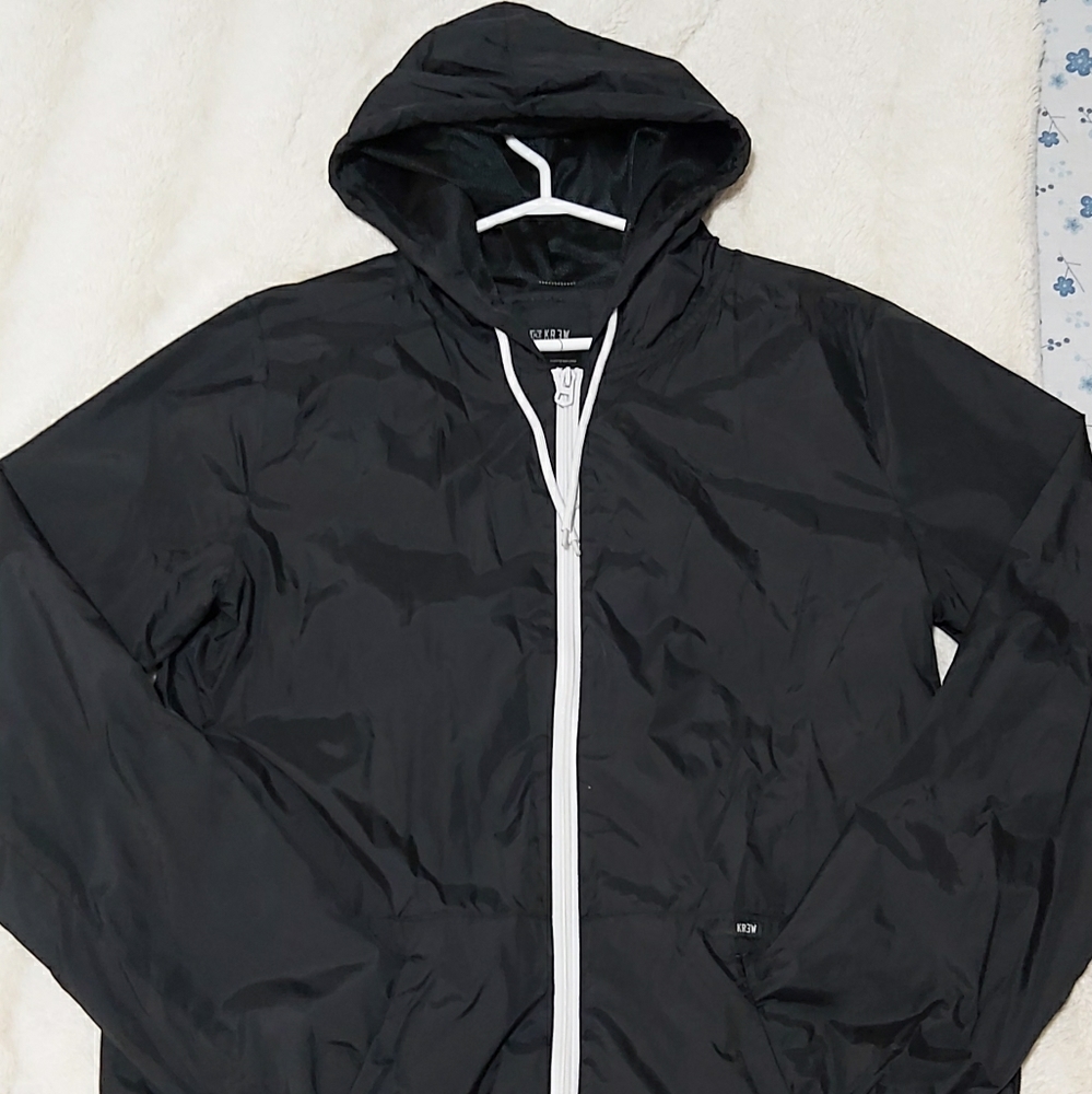 Black windbreaker/raincoat jacket